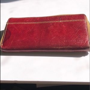 A very loved Kenneth Cole wallet!